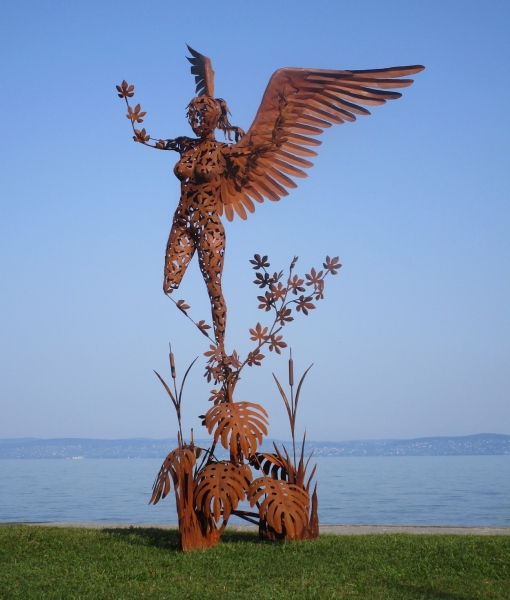 Syrinx statuette rusty iron